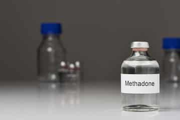 glass vile of methadone image