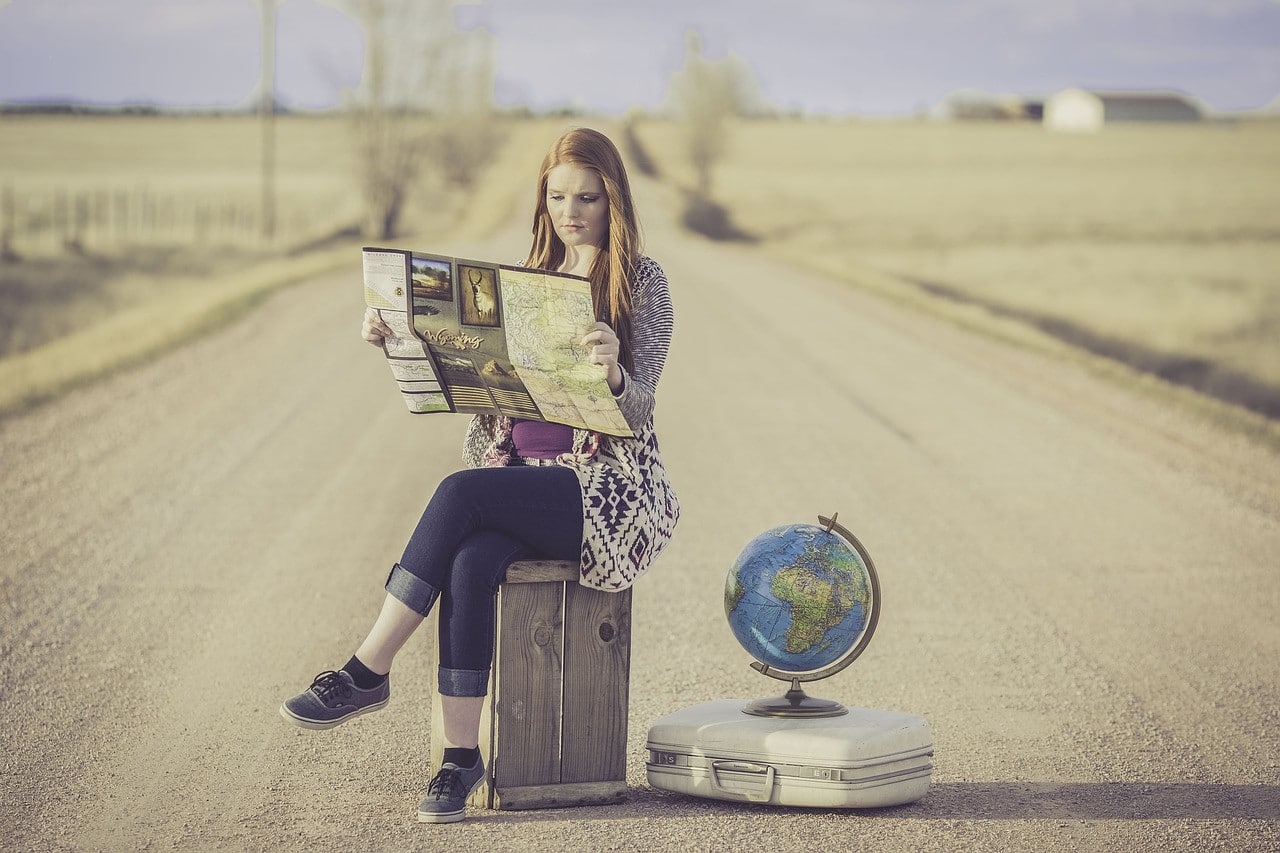 women reading map